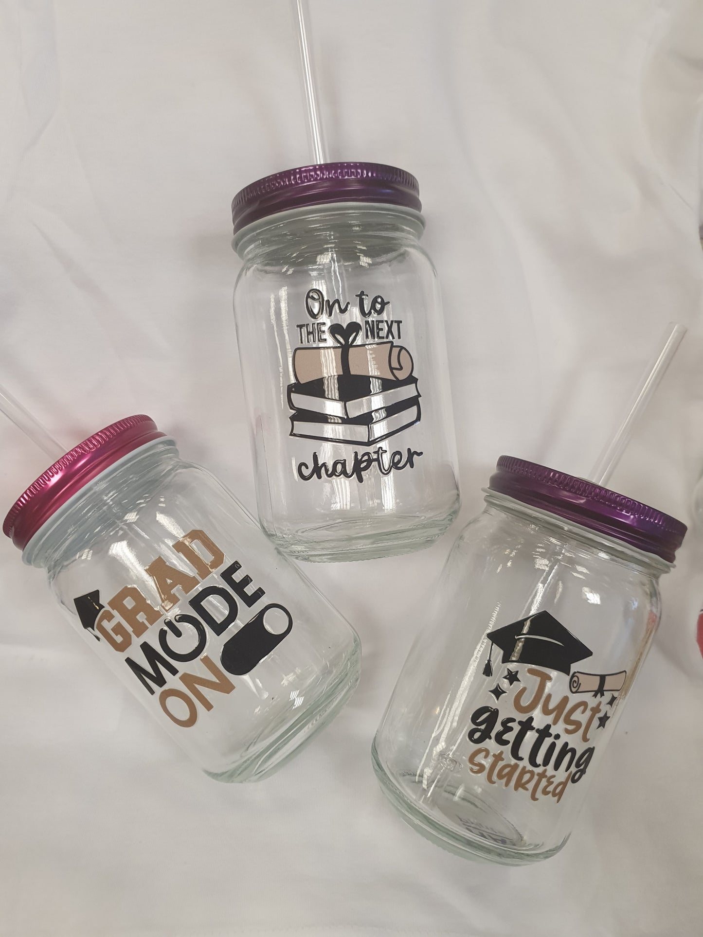 Graduation cups with straws