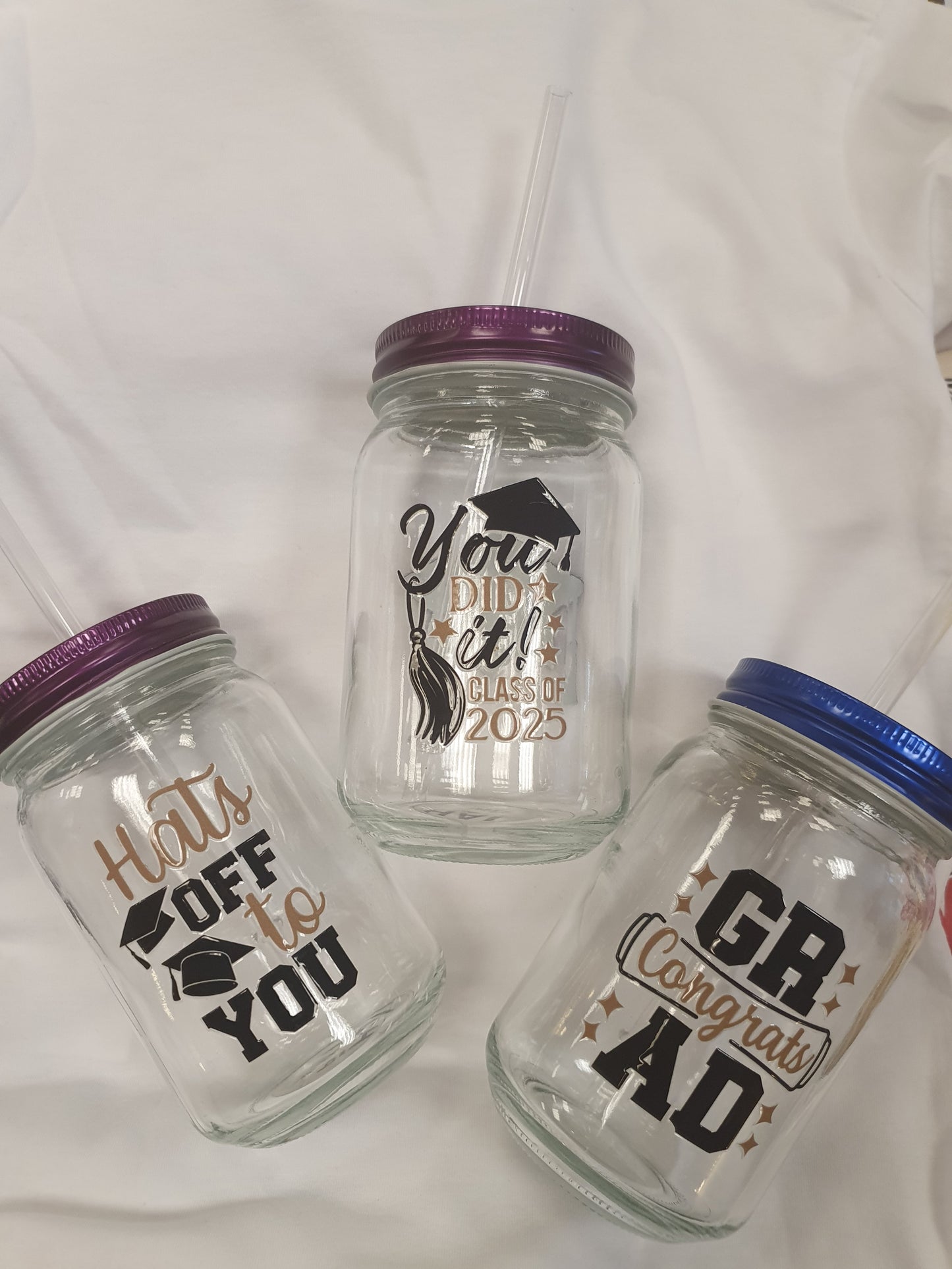 Graduation cups with straws